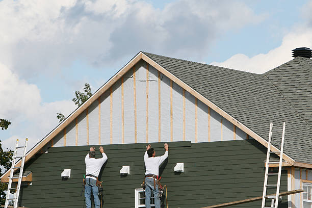Professional Storm Damage Siding Repair technician working in Townville, SC